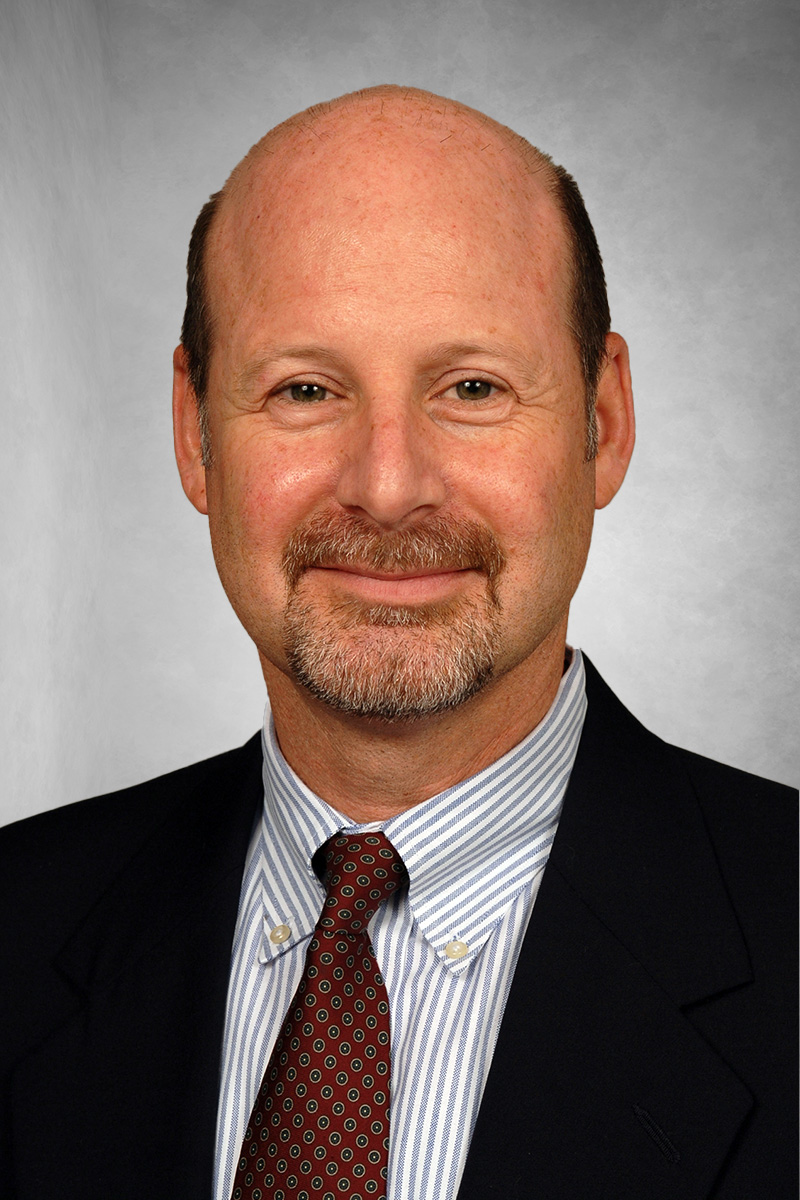 Gregory P. Adams headshot.