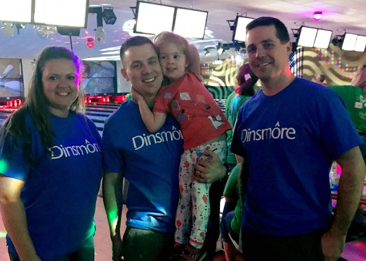Dinsmore employees at a bowling alley during a Big Brothers Big Sisters Bowl for Kids fundraiser.