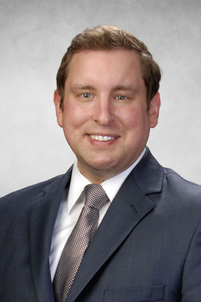 Justin M. Burns headshot.